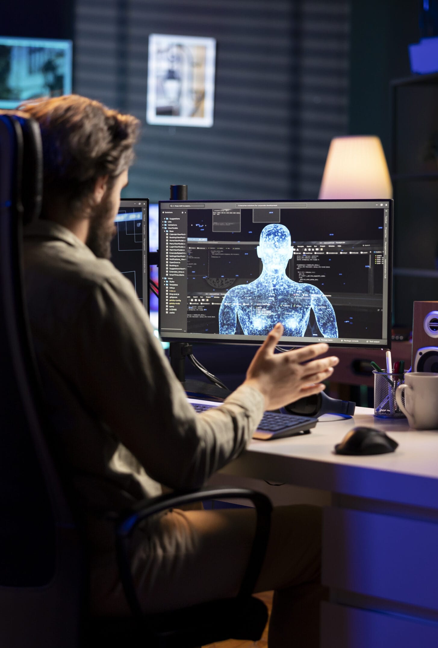 Teleworking engineer communicates with artificial intelligence entity with anthropomorphic body. IT freelancer using computer to chat with AI robot in humanoid form, scifi concept